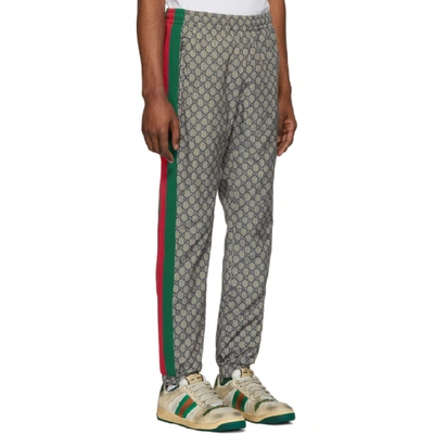 Shop Gucci Brown Nylon Gg Oversized Lounge Pants In 4350grnred