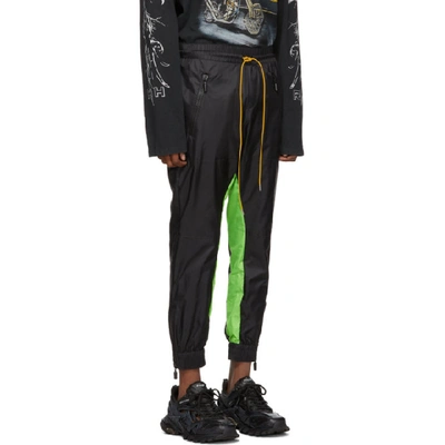 Shop Rhude Black And Green Flight Suit Track Pants In Neongrnblk