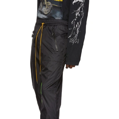 Shop Rhude Black And Green Flight Suit Track Pants In Neongrnblk