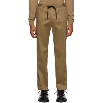 Shop Hugo Boss Boss Beige Banks Trousers In 262camel