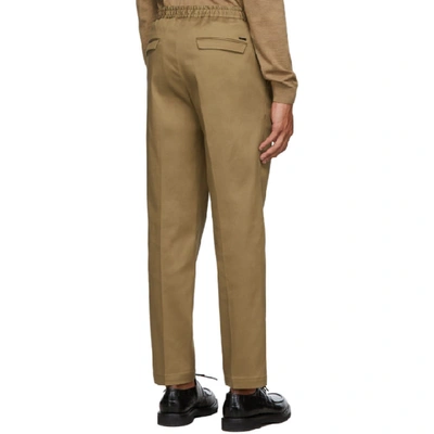 Shop Hugo Boss Boss Beige Banks Trousers In 262camel