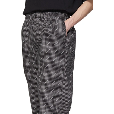 Shop Balenciaga Black And White Oversize Leg Trousers In 1070 Blk Wh