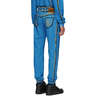 Shop Moschino Blue The Sims Edition Pixel Trompe Loeil Sweatpants In Denim