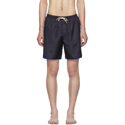 Shop Gucci Navy Logo Stripe Swim Shorts In 4487 Blue