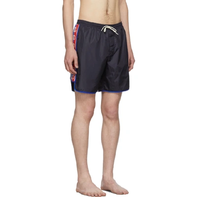 Shop Gucci Navy Logo Stripe Swim Shorts In 4487 Blue