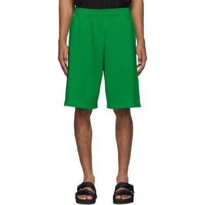 Shop Givenchy Green Logo Shorts In 329-grsgrn