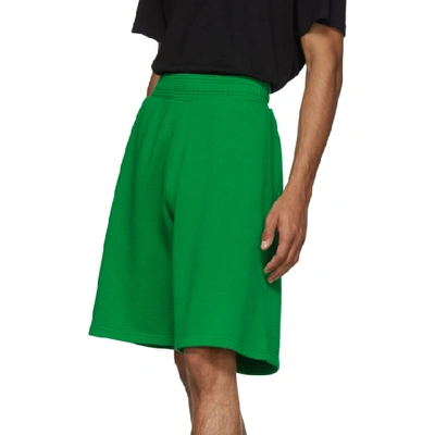 Shop Givenchy Green Logo Shorts In 329-grsgrn