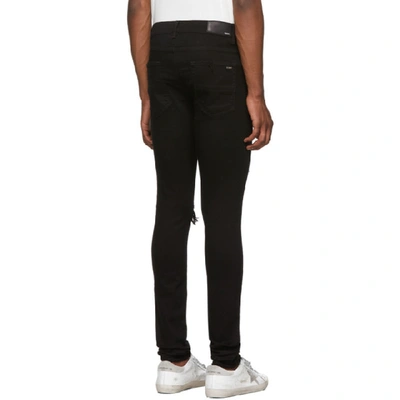 Shop Amiri Black Broken Jeans