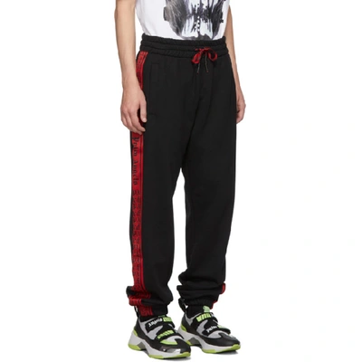 Shop Palm Angels Black And Red Side Tape Lounge Pants In 1020 Blkred