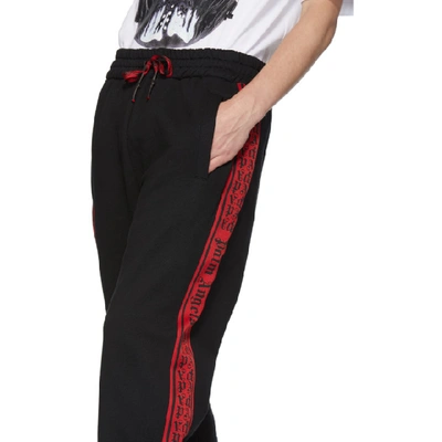 Shop Palm Angels Black And Red Side Tape Lounge Pants In 1020 Blkred