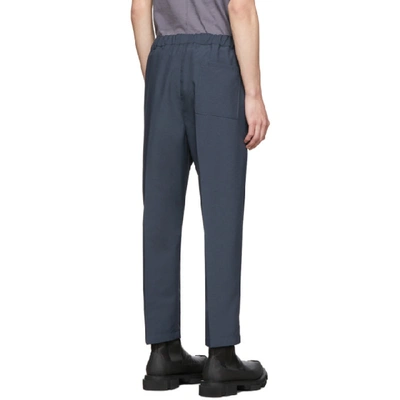 Shop Oamc Blue Cropped Drawcord Trousers In 404 Avio
