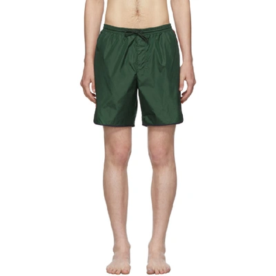 Shop Gucci Green Logo Stripe Swim Shorts In 3370 Green