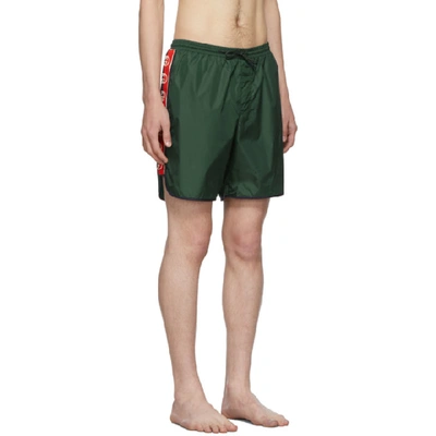 Shop Gucci Green Logo Stripe Swim Shorts In 3370 Green