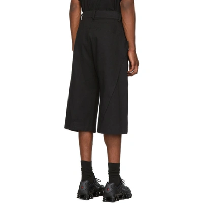 Shop D.gnak By Kang.d Black Raw Diagonal Cut Trousers