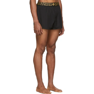 Shop Versace Underwear Black Greek Key Border Swim Shorts In A80g Black