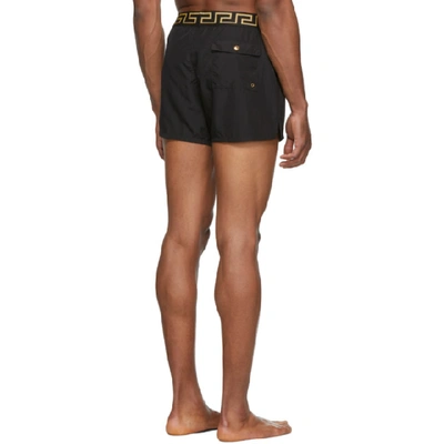 Shop Versace Underwear Black Greek Key Border Swim Shorts In A80g Black