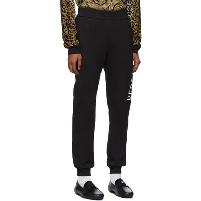 Shop Versace Black Logo Sweat Pants In A008 Black