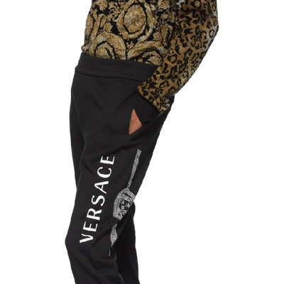 Shop Versace Black Logo Sweat Pants In A008 Black