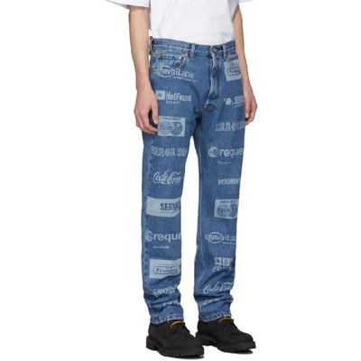 Shop Vetements Blue Fully Branded Jeans