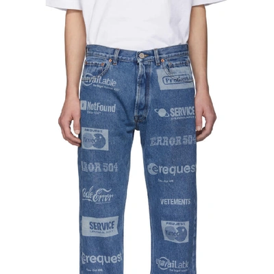 Shop Vetements Blue Fully Branded Jeans