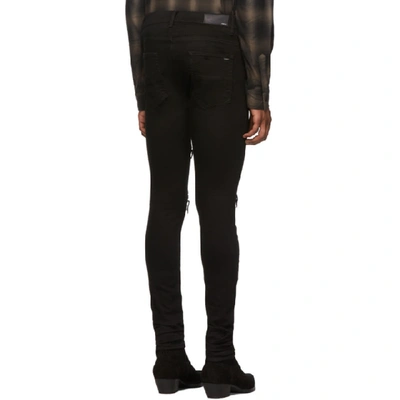 Shop Amiri Black Music Note Patch Jeans