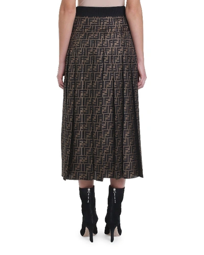 Shop Fendi Pleated Logo Midi Skirt In Brown Pattern