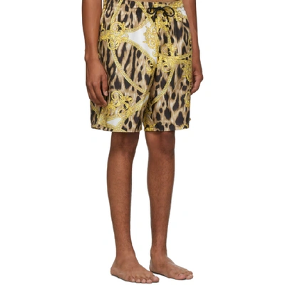 Shop Versace Underwear White And Gold Animal Swim Shorts In A771 Wht/gl