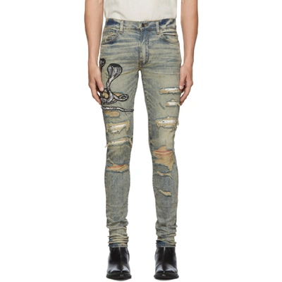 Shop Amiri Blue Art Patch Snake Jeans In Dindrtindig