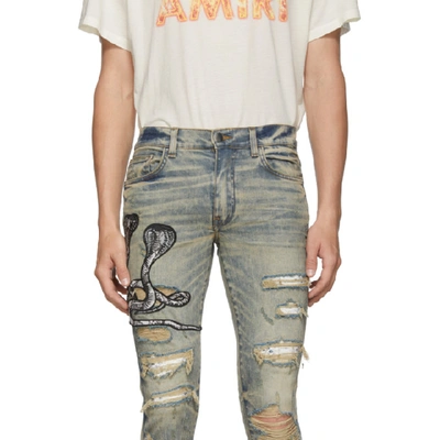 Amiri Mx1 Skinny-fit Appliquéd Faux Snake-panelled Distressed Stretch-denim  Jeans In Dindrtindig | ModeSens