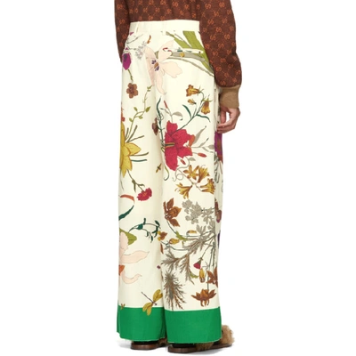 Shop Gucci Ivory Shamrock Floral Print Trousers In 3067 Flora