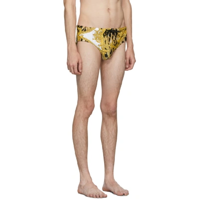 Shop Versace Underwear White And Gold Animal Swim Briefs In A771 Wh/gl