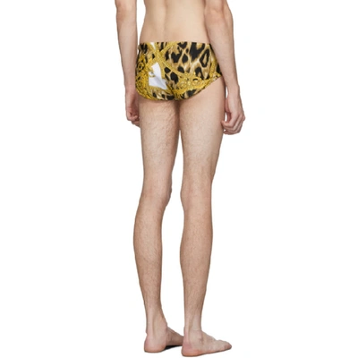 Shop Versace Underwear White And Gold Animal Swim Briefs In A771 Wh/gl