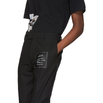 Shop Palm Angels Black Logo Trousers In 1000 Black