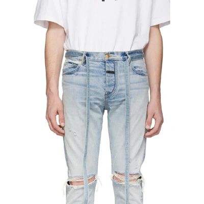 Shop Fear Of God Indigo Slim Jeans In 427vntgindg