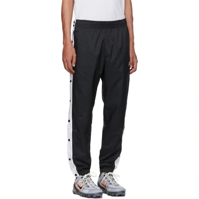 Shop Nike Black And White Tearaway Track Pants In 010blkwht