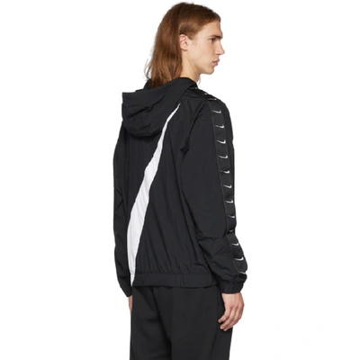 Shop Nike Black Swoosh Jacket In 010blkwht