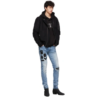 Shop Amiri Indigo Painted Military Patch Jeans In Medcrfindig