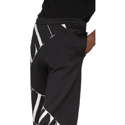 Shop Valentino Black Vltn Macrogrid Lounge Pants In 0ninero/vl