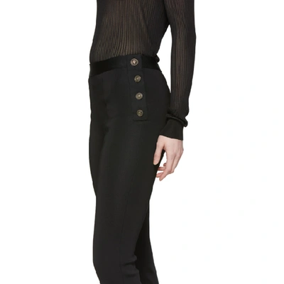 Shop Givenchy Black Knit Gold Button Leggings In 001 Black