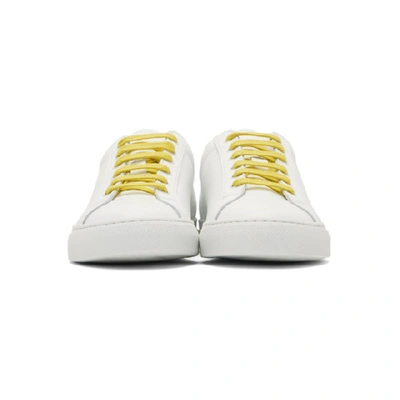 Shop Common Projects White And Yellow Retro Low Sneakers In 0574 Whtylw