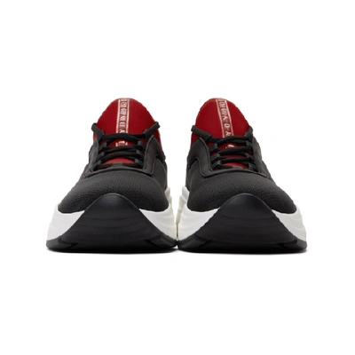 Shop Prada Black & Red Knit Prax 01 Sneakers
