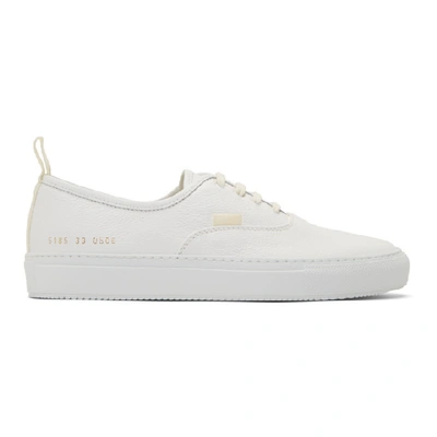 Shop Common Projects White Four Hole Leather Low Sneaker