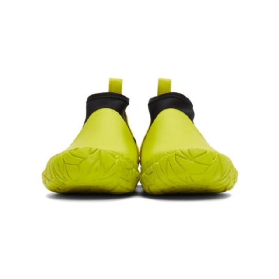 Shop Issey Miyake Men Yellow Vulcanized Mid-top Sneakers In 52.yellow