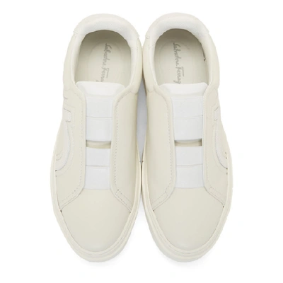 Shop Ferragamo Salvatore  Off-white Gancini Slip-on Sneakers
