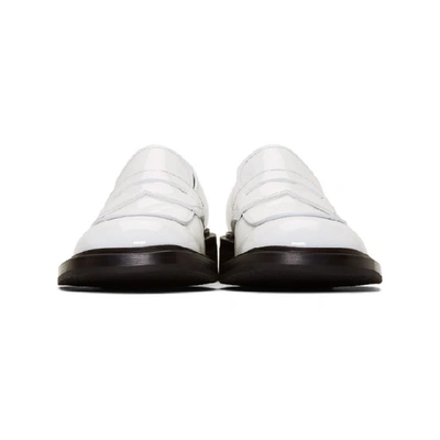 Shop Prada White Patent Penny Loafers