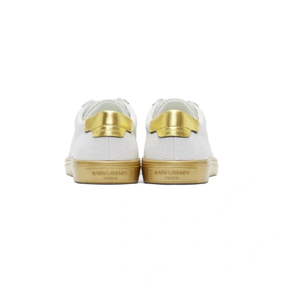 Shop Saint Laurent White And Gold Andy Sneakers In 9370 Whtgld