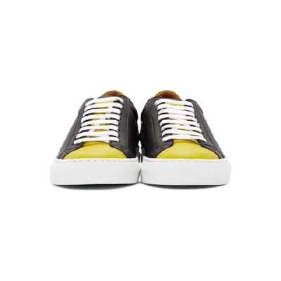 Shop Givenchy Black And Yellow Reverse Logo Urban Street Sneakers In 003 Blkylw
