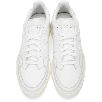 Shop Adidas Originals White Supercourt Sneakers In Whiteoffwht