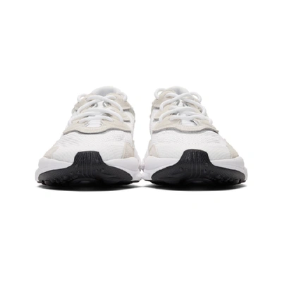Shop Adidas Originals White Ozweego Sneakers In Whitecorebl