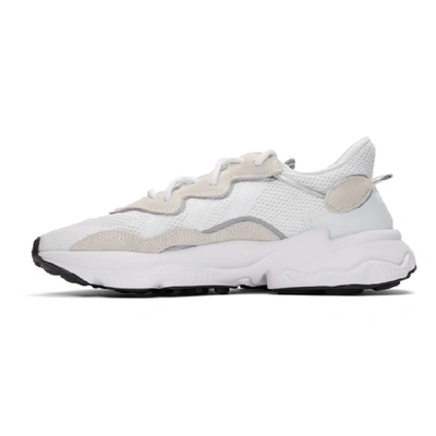 Shop Adidas Originals White Ozweego Sneakers In Whitecorebl